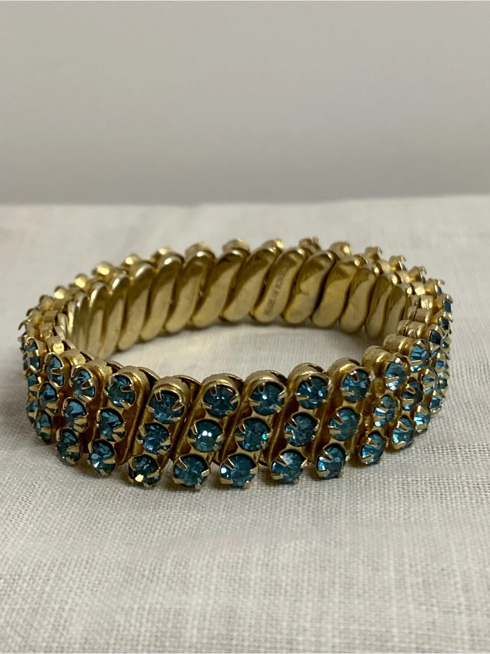 Aqua Blue Rhinestone Expansion Bracelet Stretch Gold Tone Made in Hong Kong